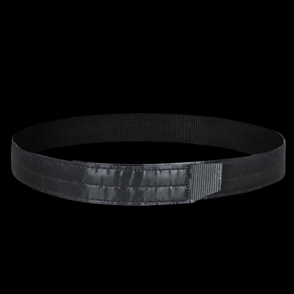 The Condor Inner Belt, a black nylon tactical belt with a hook-and-loop fastener, is shown laid flat in a circular shape against a white backgroundāperfect for EDC or bushcraft.